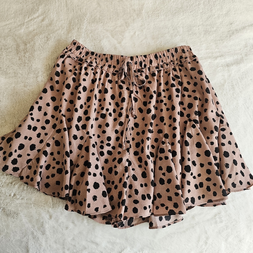 Pink and black polka dot skirt